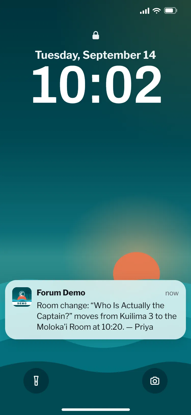 A phone lock screen with one notification from the event app: a breakout moves to another room at 10:20